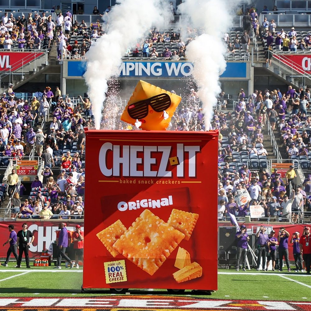 Cheez It box with smoke at stadium